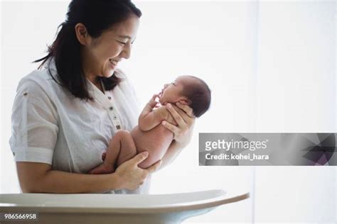 Asian Mom Bath Photos And Premium High Res Pictures Getty Images