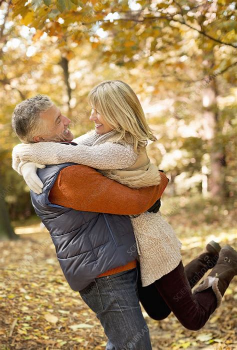 Older Couple Hugging In Park Stock Image F0137736 Science Photo