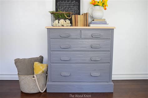 To provide a tie in to the piece's original design, i kept the original pulls and brass backs! Farmhouse rustic gray and off white dresser. Distressed ...