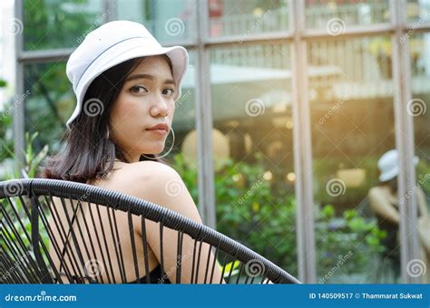 thai girl in black dress sitting at cafe stock image image of hair attractive 140509517
