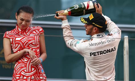 Formula 1 Champion Lewis Hamilton Under Fire For Spraying Podium Girl