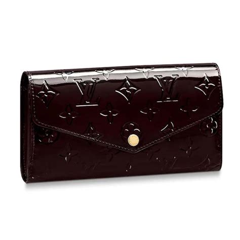 This has a flap to fold closed. Louis Vuitton LV Women Sarah Wallet in Monogram Vernis ...
