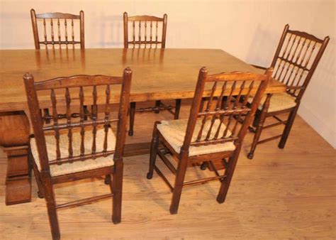 Adorable setup for a traditional kitchen furnished with a rectangular, thin dining table, a bench, stool and a dining chair, all covered in white. Oak Farmhouse Refectory Table Kitchen Dining Tables Rustic ...