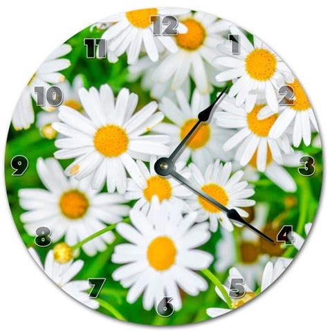 A Clock With White And Yellow Daisies On It S Face Showing The Time