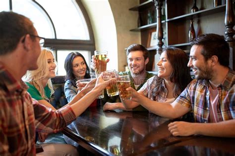 Happy Friends Drinking Beer At Bar Or Pub Stock Image Image Of Happy