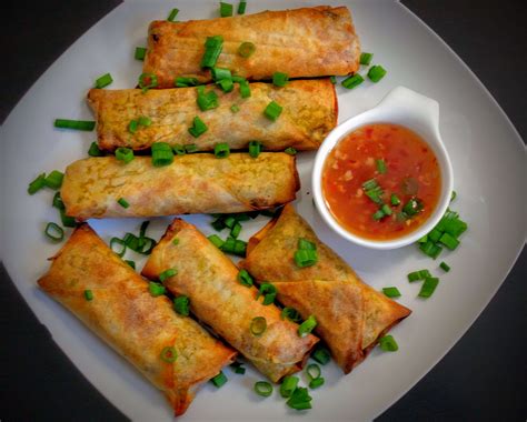 Veg spring rolls, a classic chinese dish that is enjoyed by everyone, children in particular. Veg Spring Rolls Recipe | VegeCravings