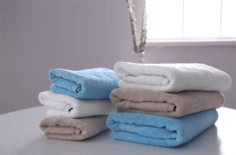 Stacks Of Clean Towels On Table Stock Image Image Of Fluffy Hygiene