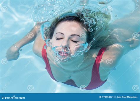Woman Emerging From Swimming Underwater At The Pool Stock Image Image