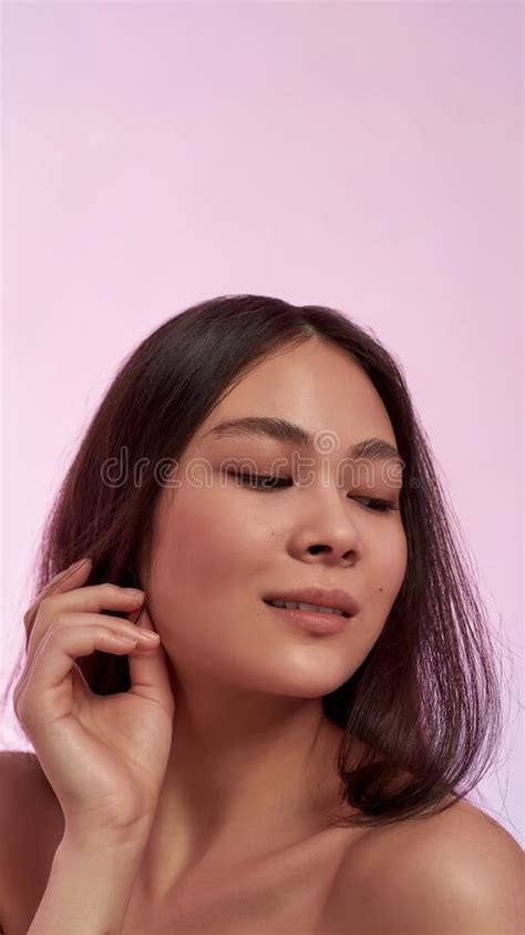 Beautiful Naked Asian Woman With Healthy Glowing Skin Stock Photo