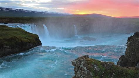 Colorful Summer Sunset On The Godafoss Waterfall On Skjalfandafljot