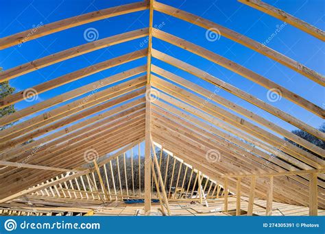 In Progress Construction Of A Timber Truss Framed Building With Rafters