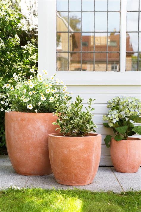 Classic Terracotta Garden Pots Never Go Out Of Style This Set Of 3