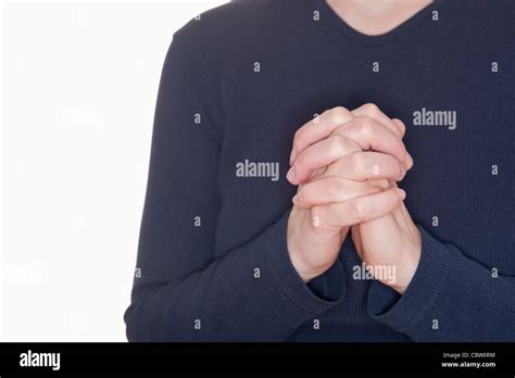Woman Praying With Her Hands Clasped Stock Photo Alamy