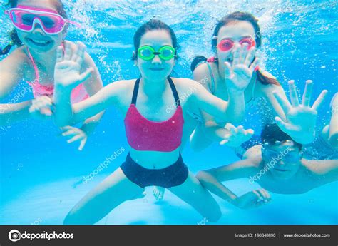 Little Kids Swimming Pool Underwater — Stock Photo © Yanlev 198848890