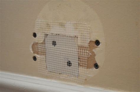 How To Patch A Hole In Your Drywall The Art Of Manliness