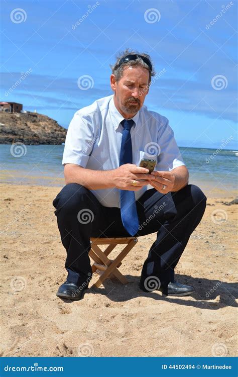 Business Man In Suit On The Beach Calling By Mobil Stock Photo Image