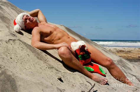 Nude Santa Sleeping On The Beach Photograph By Gunther Allen Fine Art
