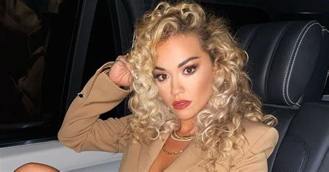 Rita Ora Goes Braless In Blazer And Skintight Leather Shorts For