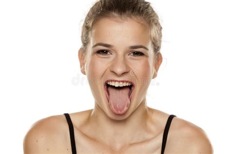 Young Woman With Her Tongue Out Stock Image Image Of Woman Funny 187883783
