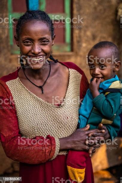 Young African Mother Holding Her Baby Central Ethiopia Africa Stock