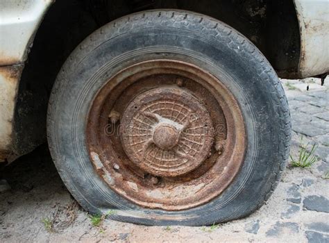 Old Flat Tire On A Retro Car Urban Motif Stock Image Image Of