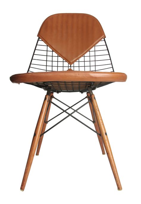 The eames shell chair design by charles and ray eames extends to a diverse family of dining chairs, side chairs, rocking chairs, and eames shell chairs. Early Eames dowel chair. | Collectors Weekly