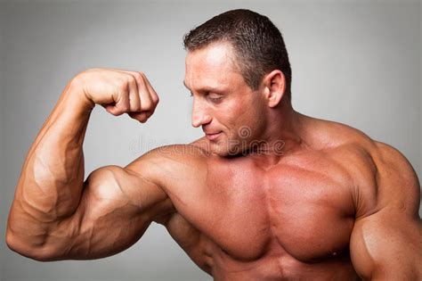 Muscular Man Flexing His Biceps Stock Image Image Of
