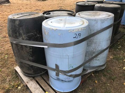 4 Plastic 50 Gal Drums On Pallet Adam Marshall Land And Auction Llc