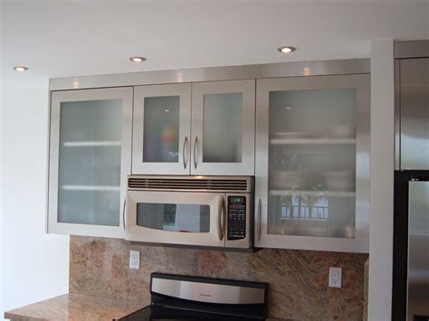 In installing your kitchen cabinet, the very first step would be to make a mark on the wall where the cabinets are going to be adjoined. Steel Kitchen Cabinet Doors With Stainless Steel Kitchen ...