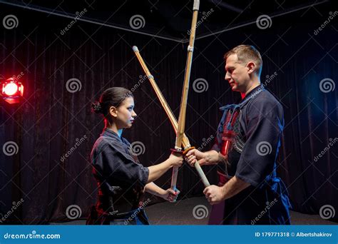 Two Kendo Fighters Practicing Kenjutsu Japanese Martial Art Using