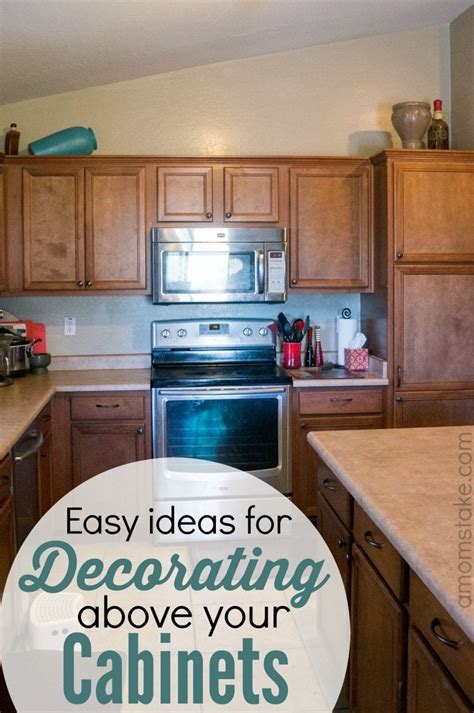 This will work especially well in kitchens with white cabinets and walls because the baskets will pop without taking away from the airy feel. Ideas for Decorating Above Your Cabinets - A Mom's Take