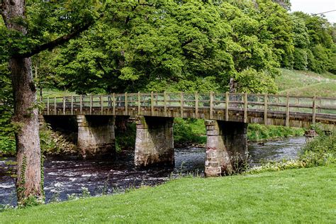 Footbridge Over The River Wharfe At Bolton Abbey In The Yorkshire Dales