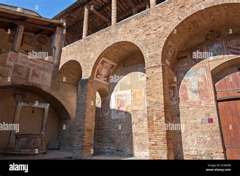courtyard 14th century palazzo del popolo city museum frescoes by sodema frescoes san