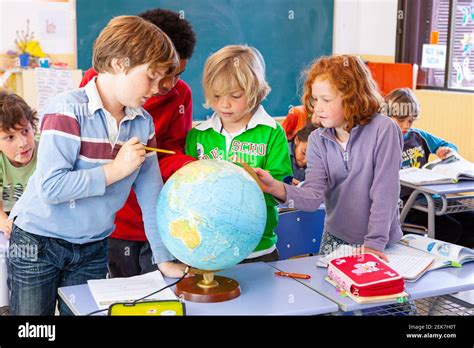 Geography Lesson In An Elementary School Classroom Stock Photo Alamy