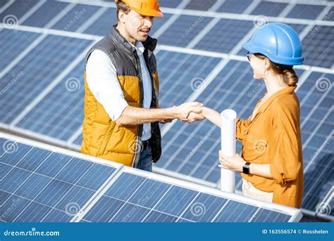 Engineers On A Solar Power Station Stock Photo Image Of Expertise