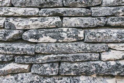 Rustic Ancient Handcraft Tile Stack Stone Wall As Background In Stock