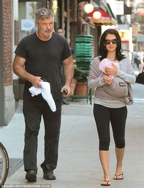 Hilaria Baldwin Cradles Sleeping Daughter Carmen In A Sling While Alec Does His Bit Daily Mail