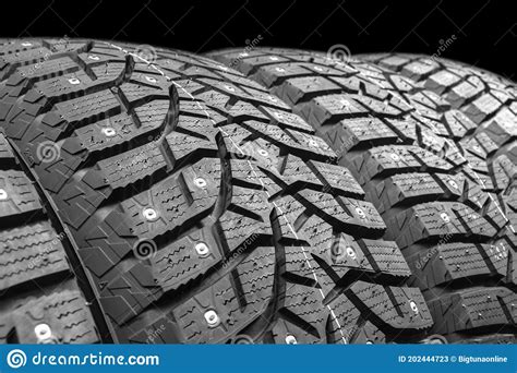 Winter Studded Tire Winter Car Tires Isolated On Black Background