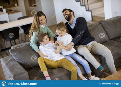 siblings fighting over tv remote control at home stock image image of
