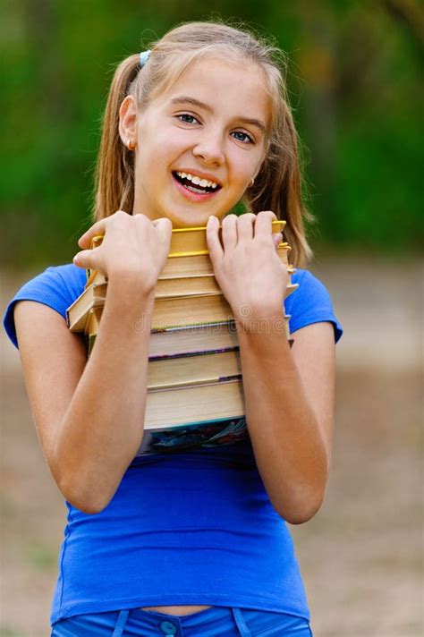 Teenager Girl Holding Stack Stock Photo Image Of Book Hands 24100182