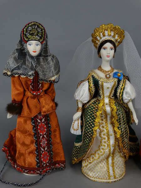Lot Of 4 Russian Porcelain Dolls