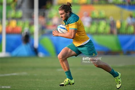 Australias Lewis Holland Runs With The Ball In The Mens Rugby Sevens