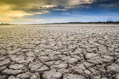 Land With Dry And Cracked Ground Desert Stock Photo Download Image