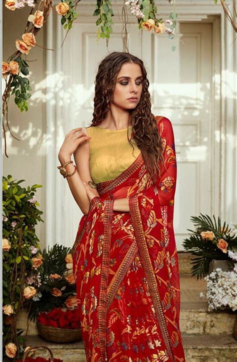red saree with contrast blouse in golden metallic