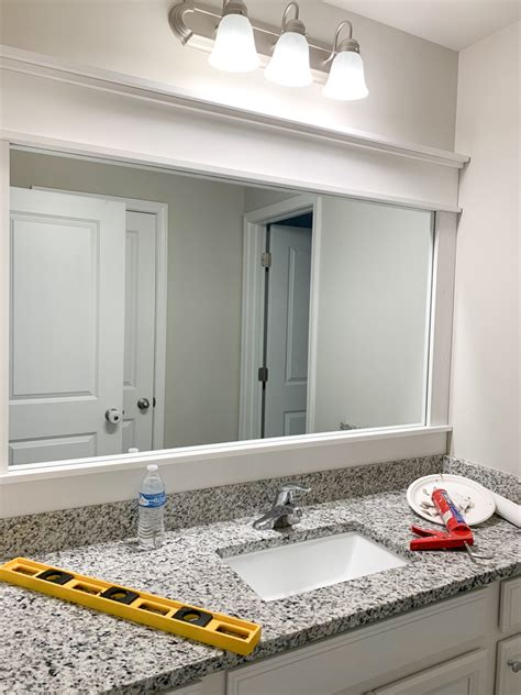 Diy How To Frame A Builder Grade Bathroom Mirror Home And Hallow