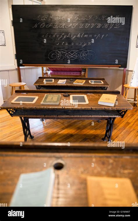 One Room Schoolhouse Interior With Blackboard And Desks Stock Photo Alamy