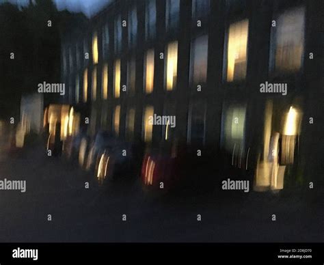 Blurred Building At Night Stock Photo Alamy