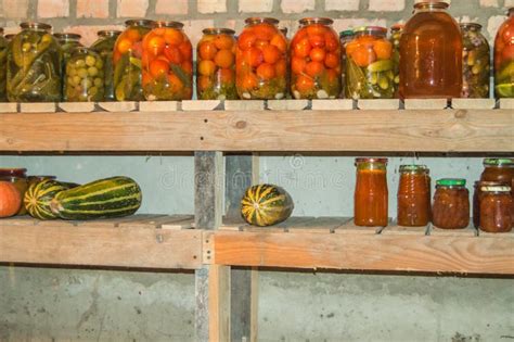Glass Jars For Storing Food With Canned Vegetables Fruits And Berries