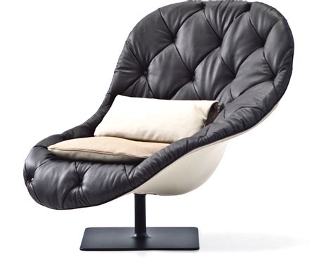 The seat height varies between 43.5 to 47 inches. Bohemian Tall Armchair - hivemodern.com