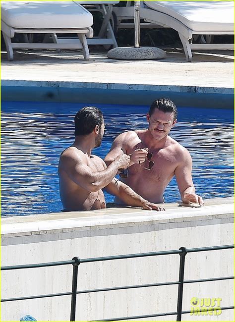 Luke Evans Shows Off His Shirtless Body In The Pool With Victor Turpin Photo Luke